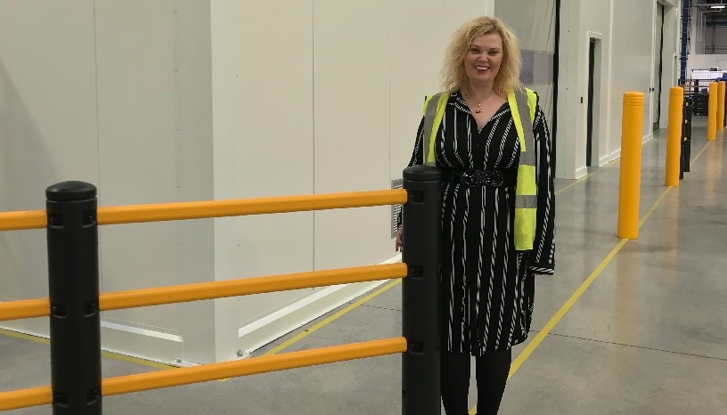 Emma Panter McCue director with safety barriers.jpg