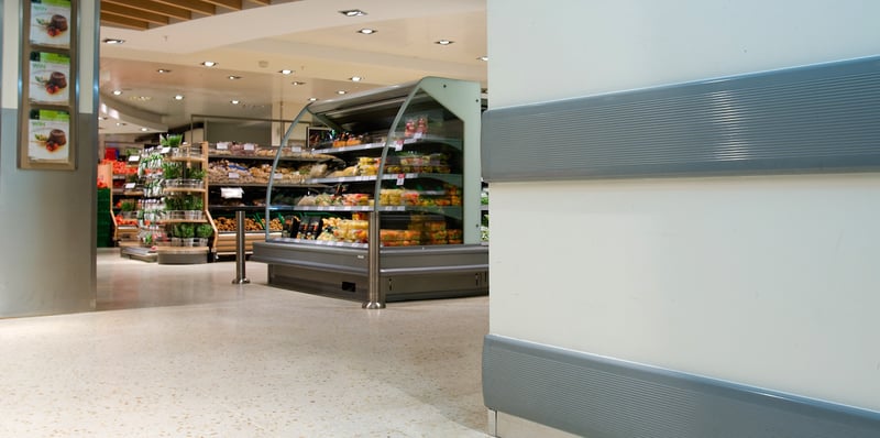 Wall Guards Protecting a Grocery Store