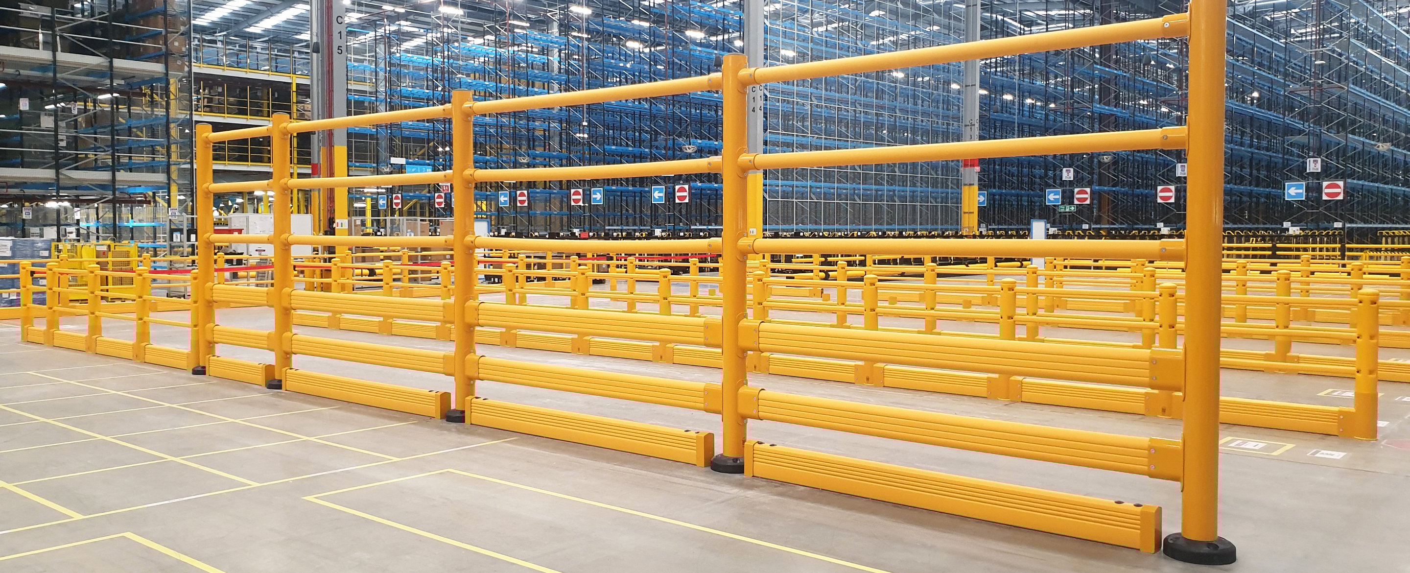 SafeStop and Topple Barrier pedestrian separation system installed across a large-scale distribution center floor