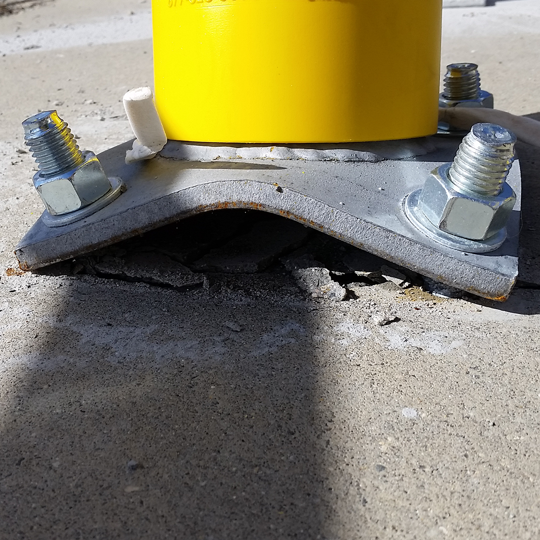 Damaged Bollard and Concrete