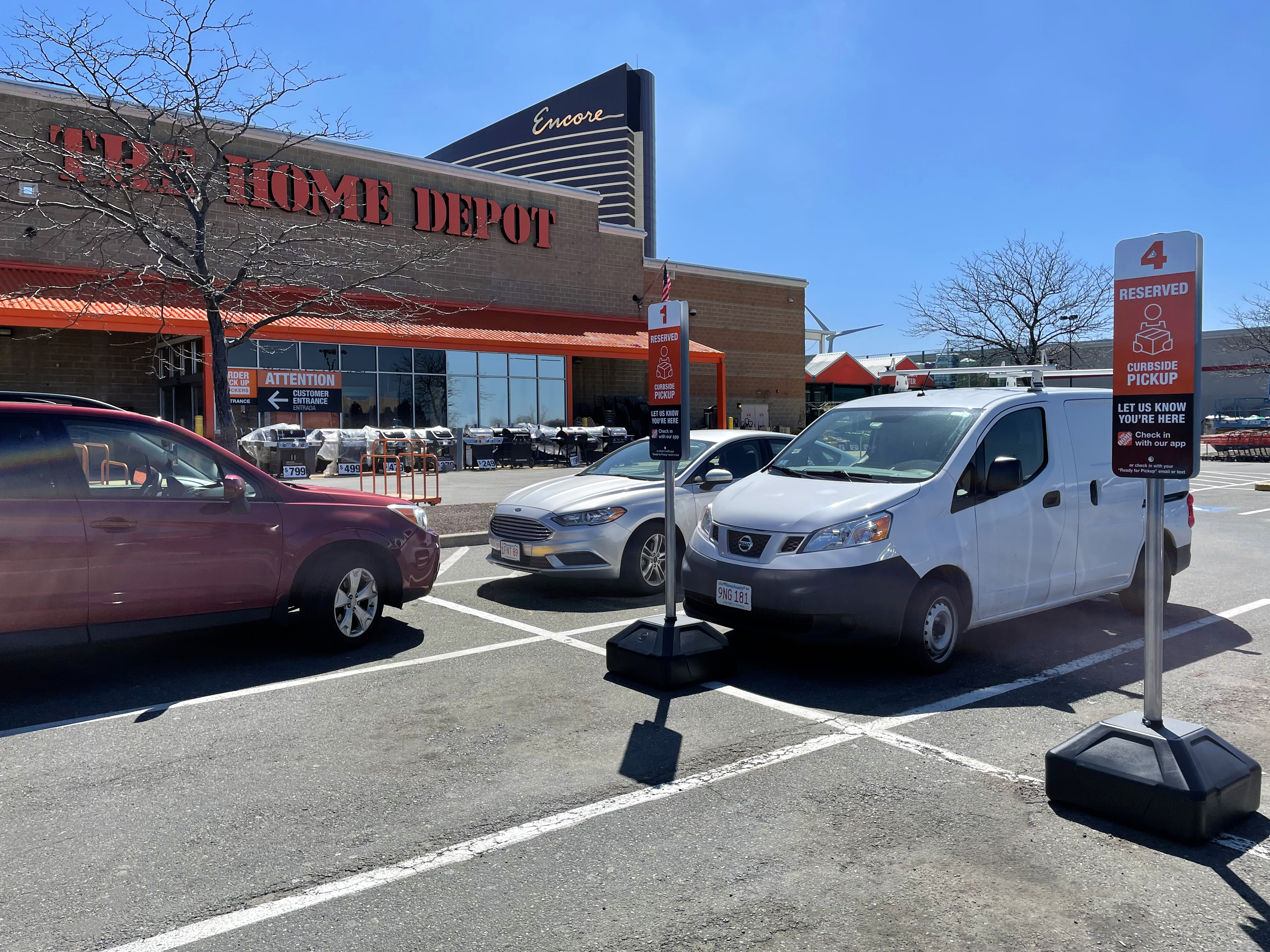 BumperSign Mobile with 12x18 Sign in a parking lot