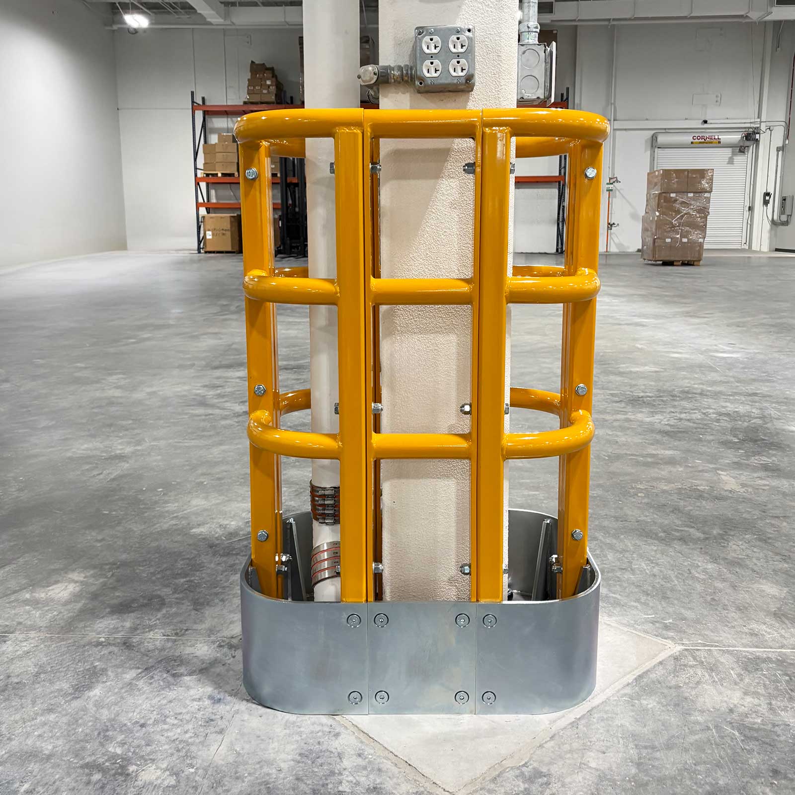 ColumnProtector around a white column on an open facility floor, with pallet racking in the background.