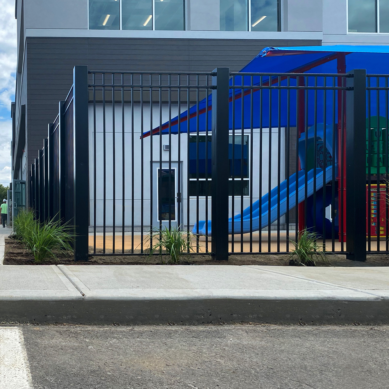 McCue Crash Tested ASTM F3016 CrashCore Bollard Protecting Store