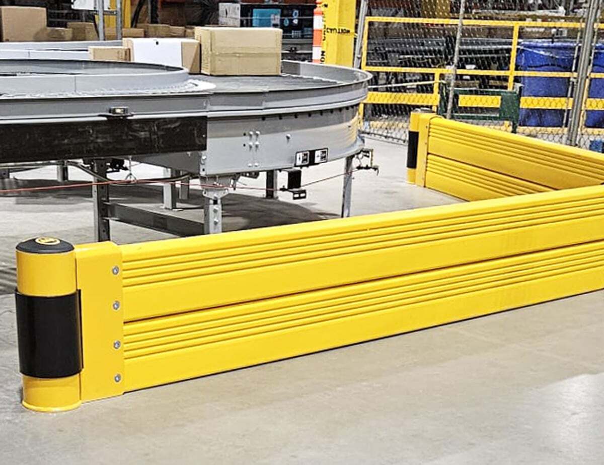 GroundBarrier Double along a curved conveyor line in a distribution center.