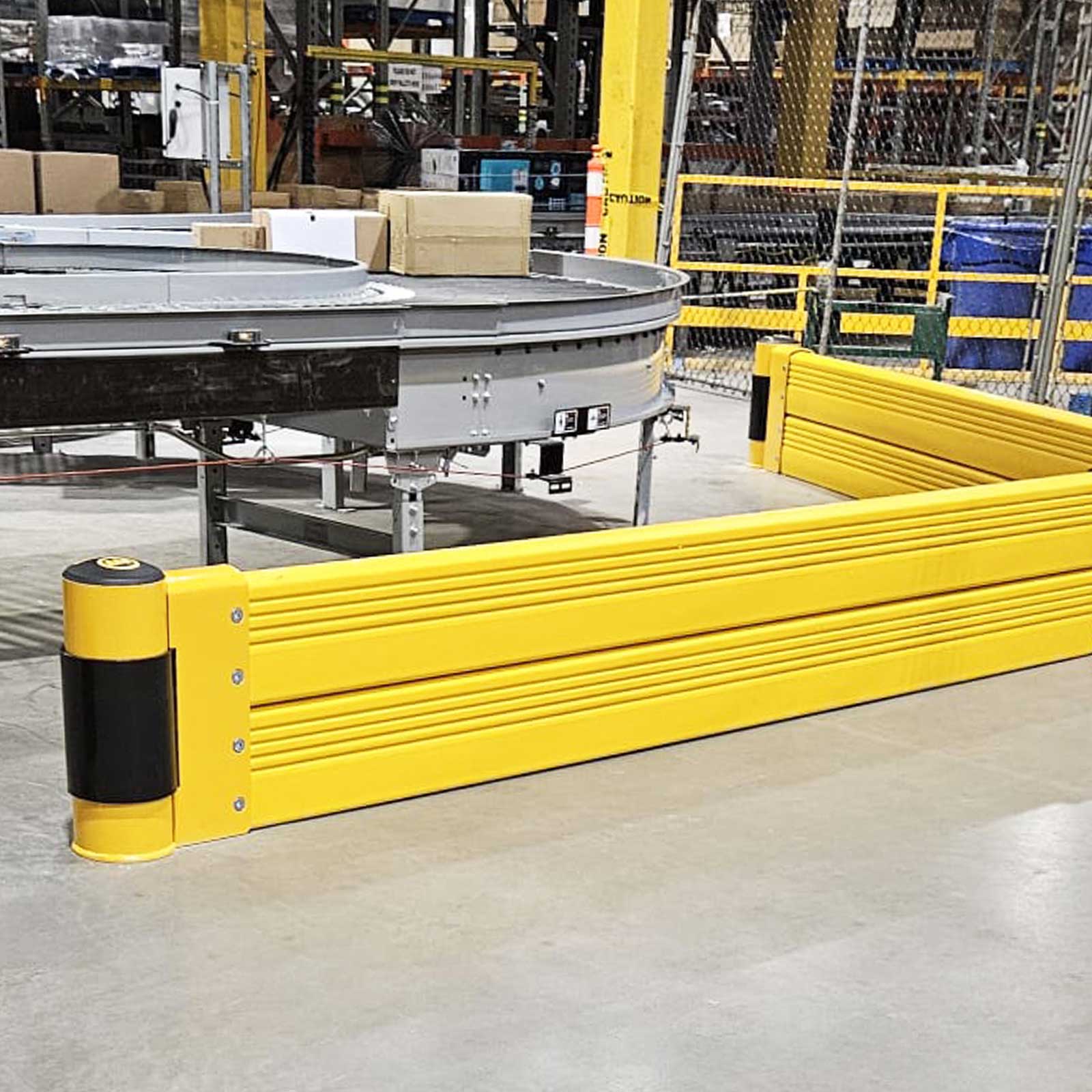 GroundBarrier Double protecting the base of a curved conveyor line in a distribution center.