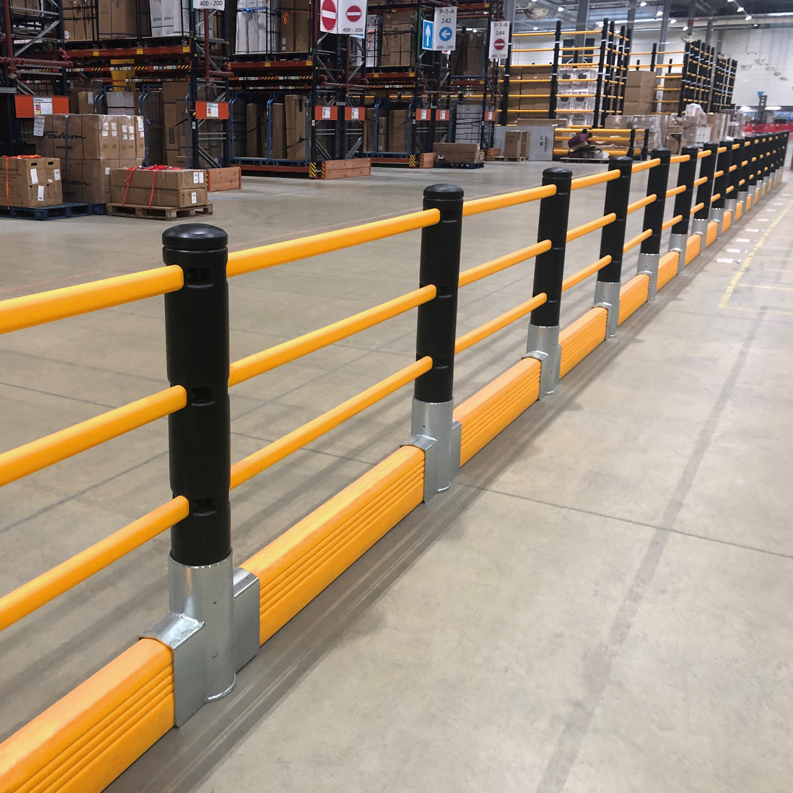 McCue Pedestrian Barrier Safety Protection with Floor Mounted Crash Barrier PLUS in Warehouse