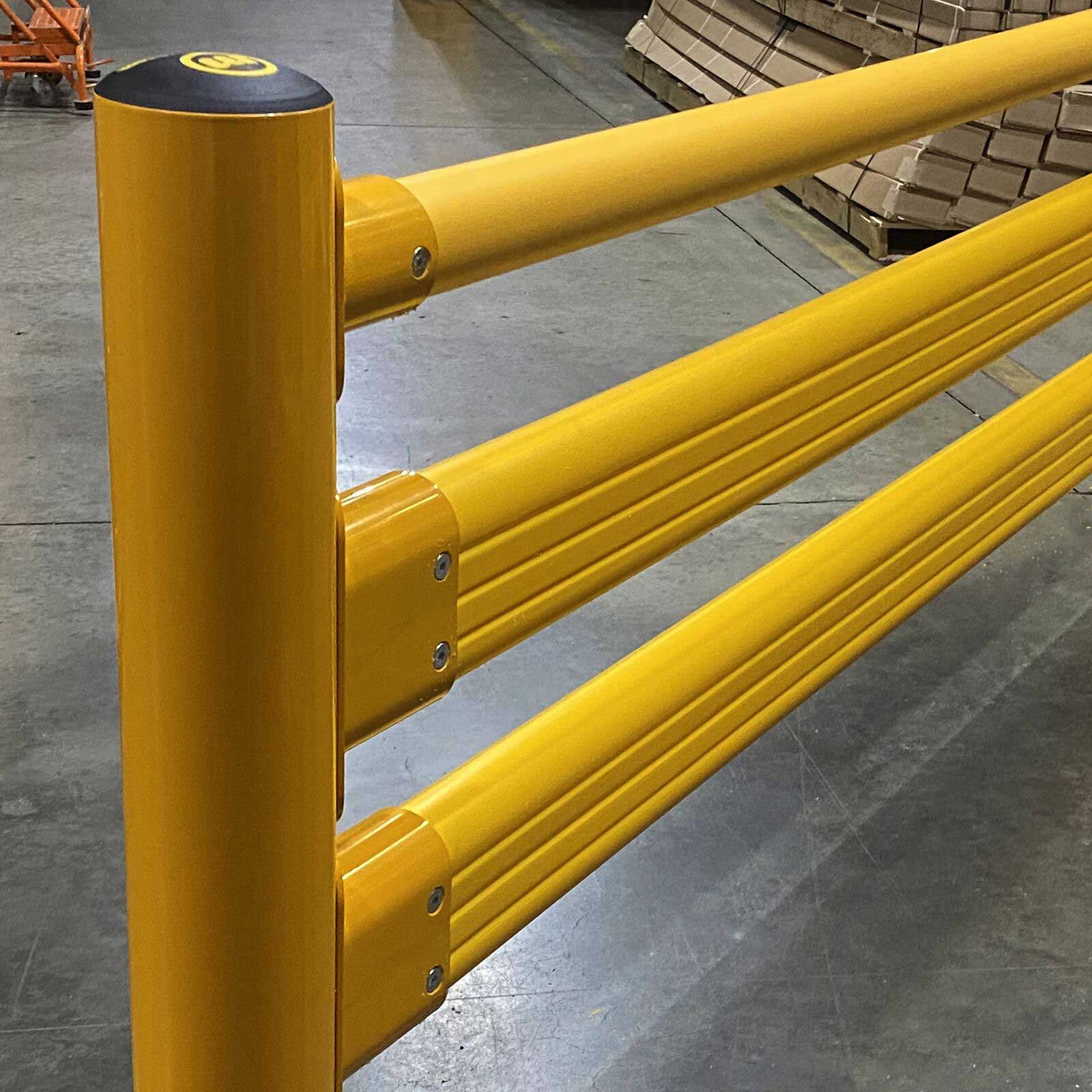 Close-up of a SafeStop Pedestrian GuardRail post with its top handrail and two lower rail connections.