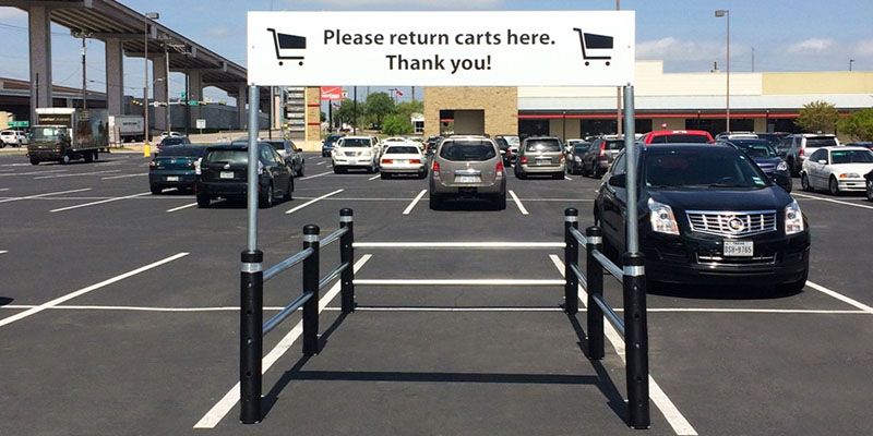McCue Cart Corral with signage in Parking Lot