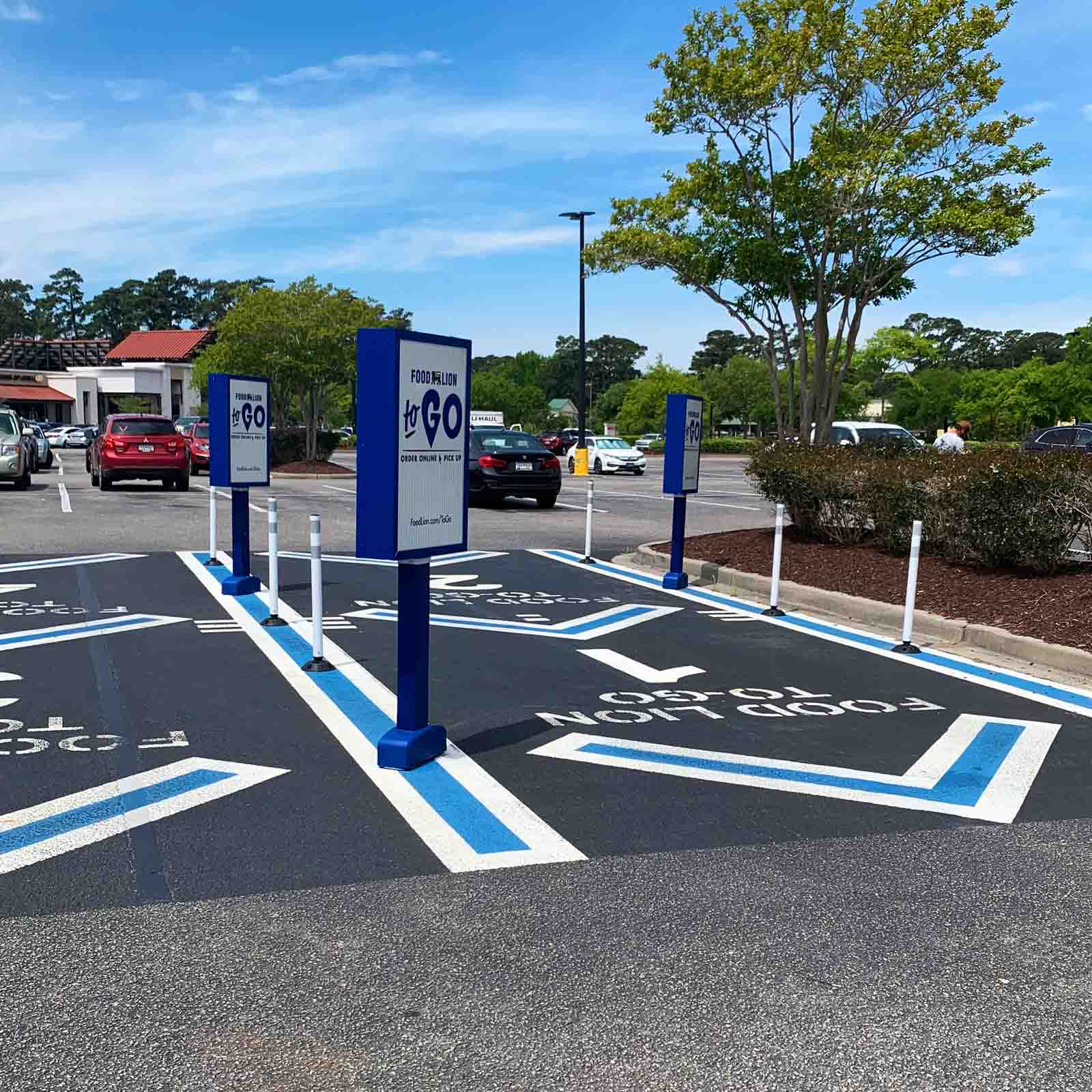 McCue Parking Lot Sign In Parking Lot