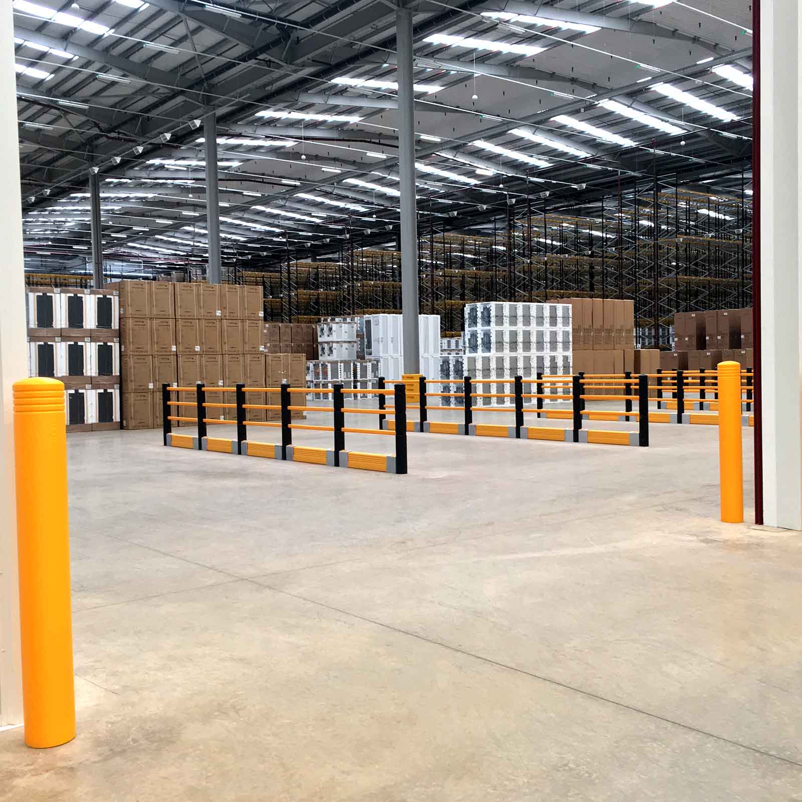 McCue Pedestrian Barrier Safety Protection with Floor Mounted Crash Barrier in Warehouse