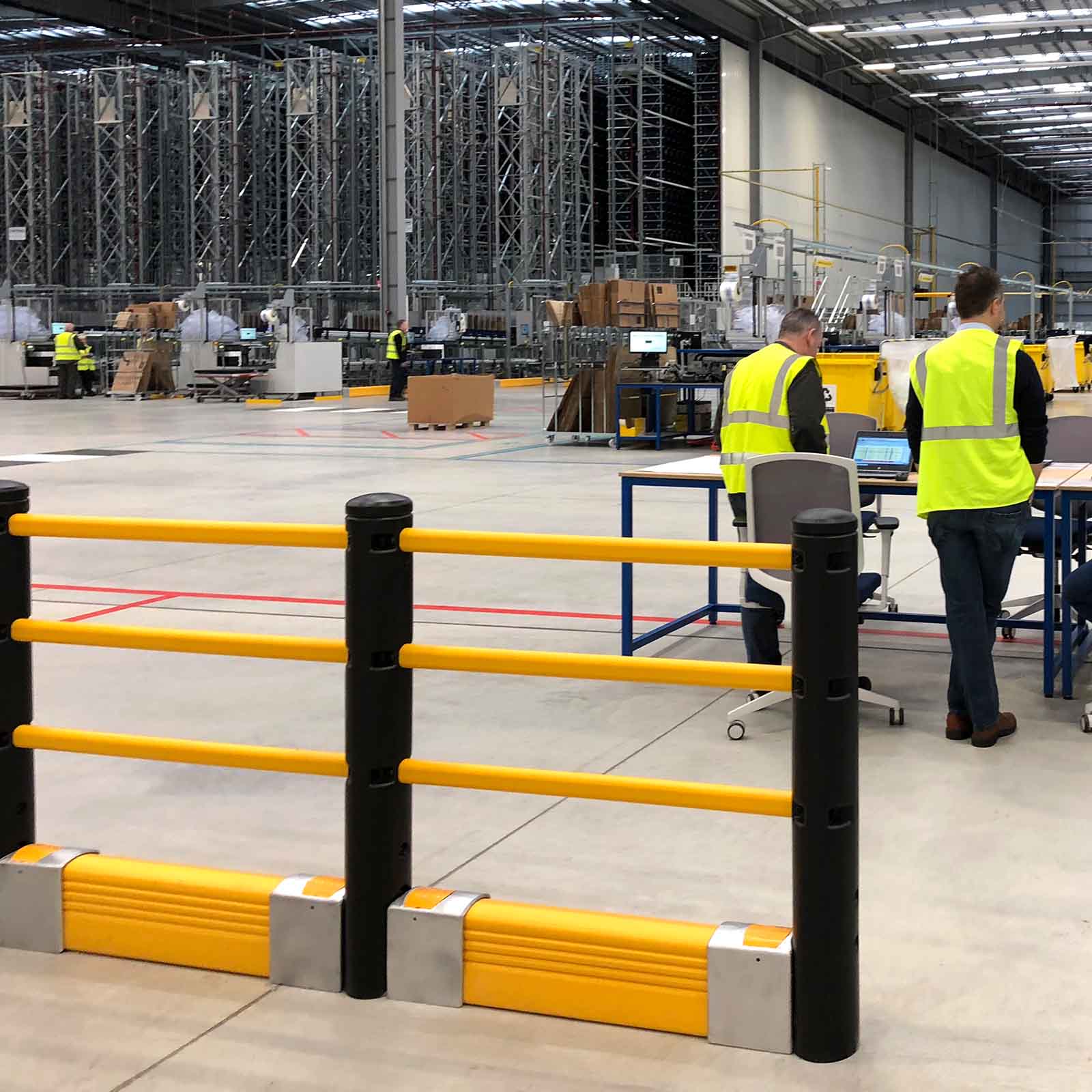 McCue Pedestrian Barrier Safety Protection with Floor Mounted Crash Barrier in Warehouse