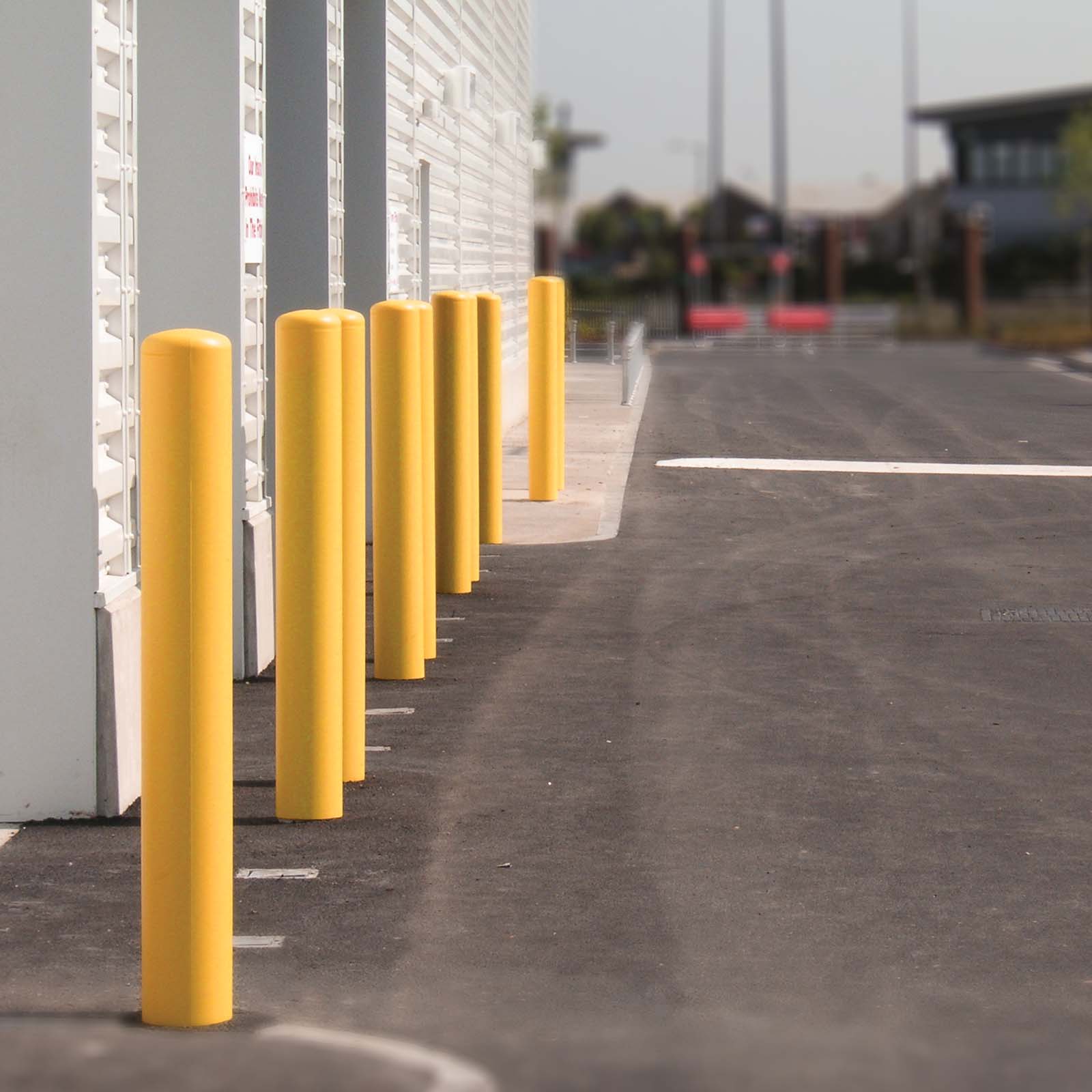 McCue Post Cover over old rusted Bollard