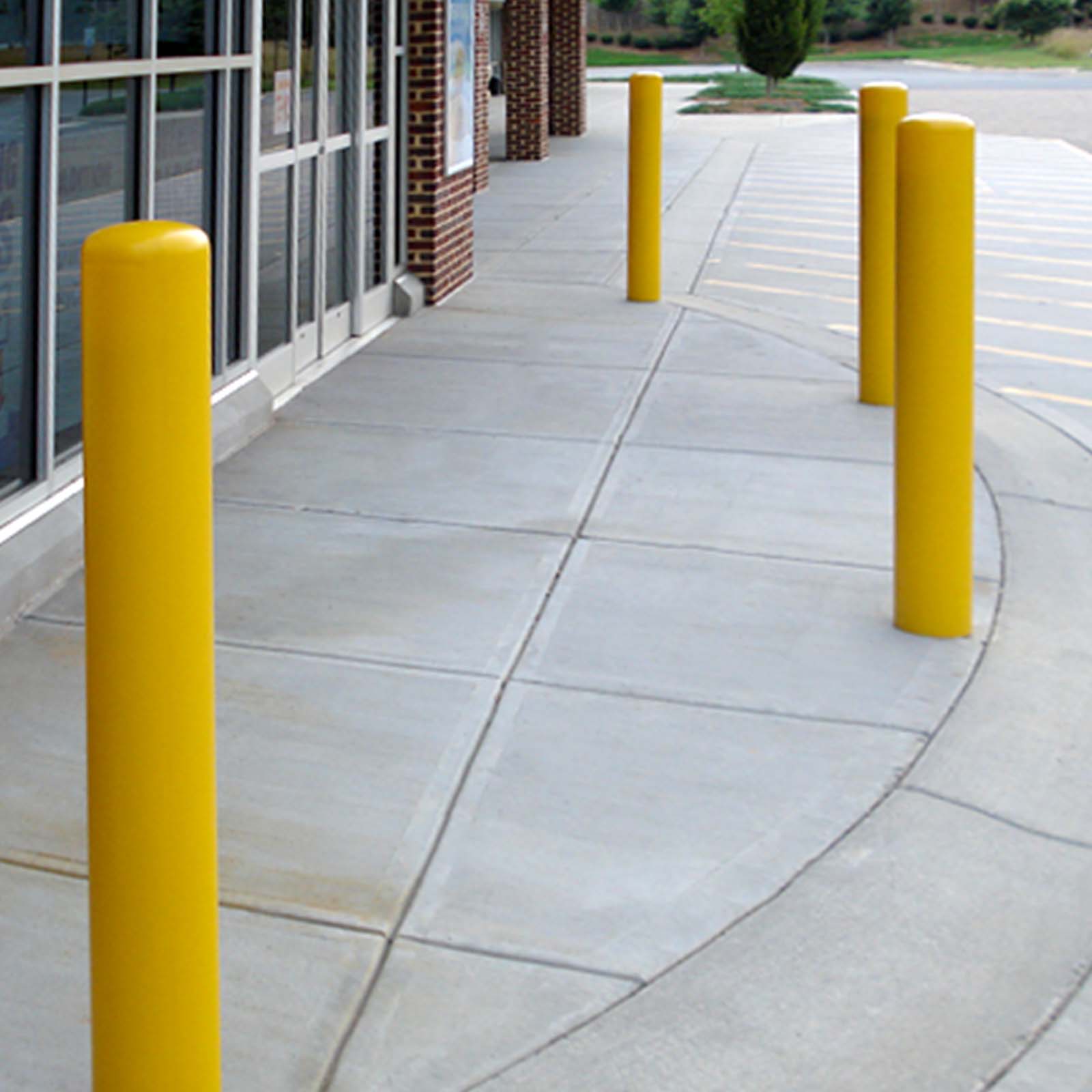 McCue Post Cover over old rusted Bollard